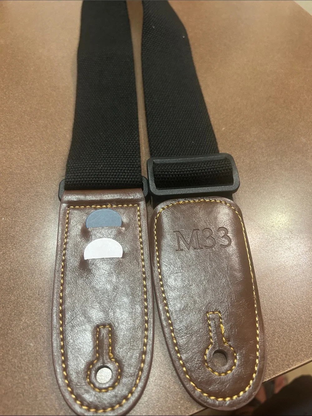 M33 Black/Brown Leather-End Guitar Strap, adjustable with pic holder